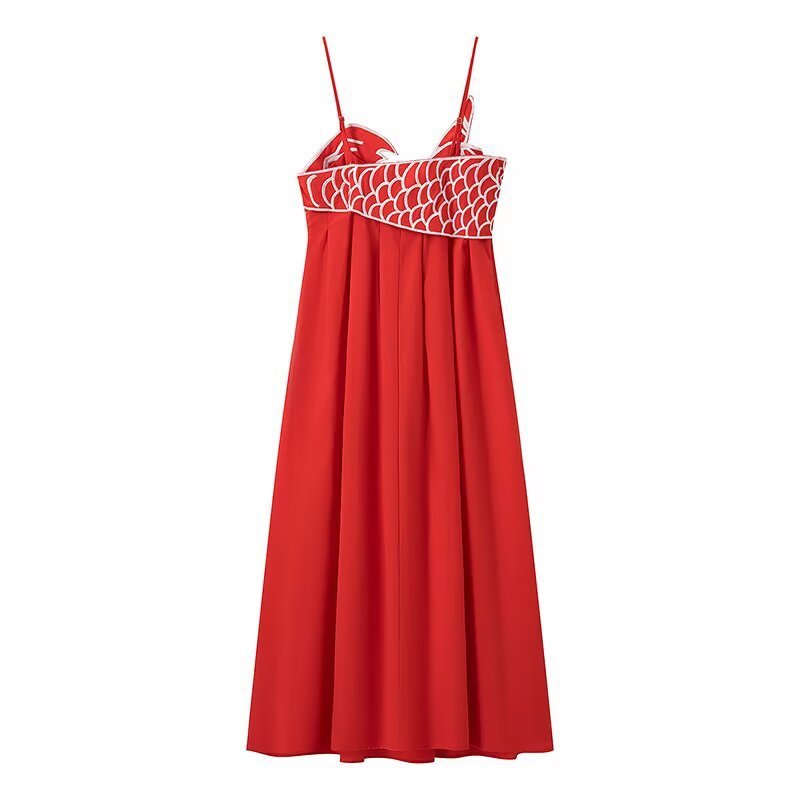 Maxi dress for women with a playful fishnet design and adjustable spaghetti straps Lune London