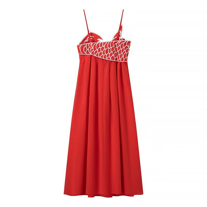 Maxi dress for women with a playful fishnet design and adjustable spaghetti straps Lune London