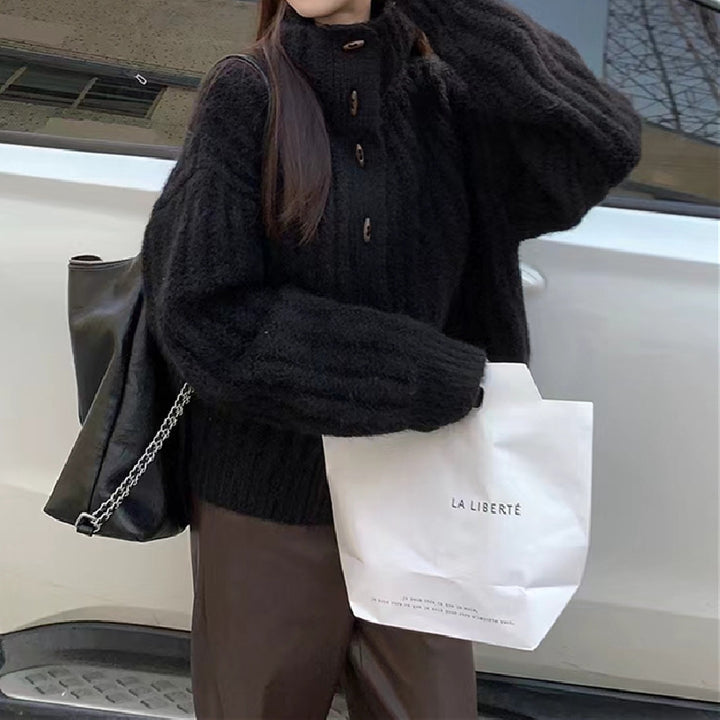 Cozy knitted sweater for women with a high collar and button details Lune London