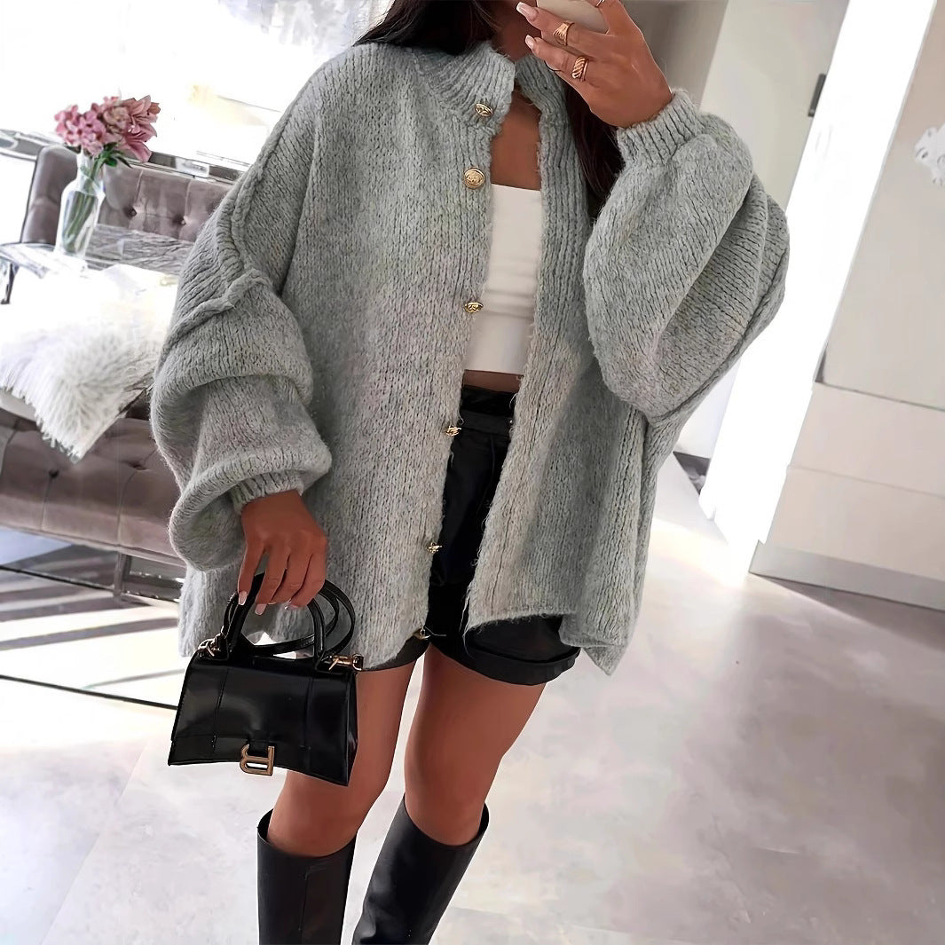 Oversized knit jacket for women with elegant puff sleeves and a chic button placket