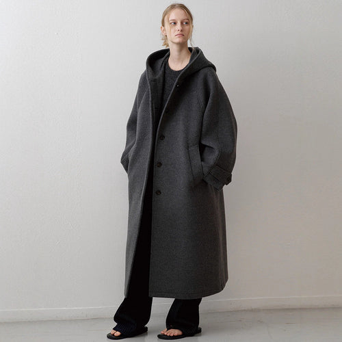Manteau surdimensionné élégant pour femmes avec capuche et poches pratiques Chic & Stil