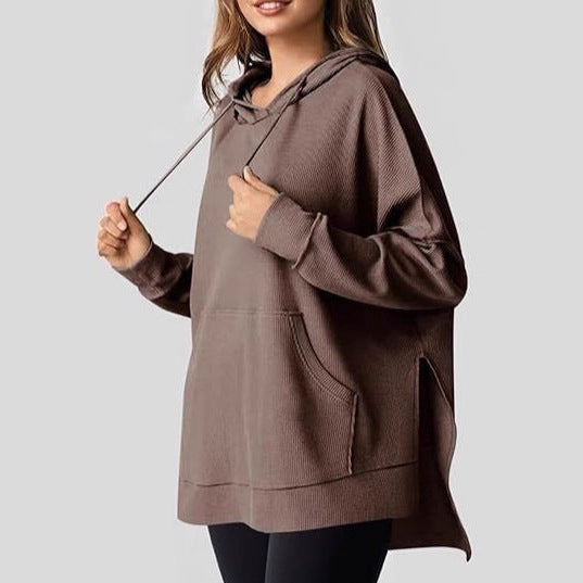 Oversized women's hoodie with side slits and practical pockets Lune London
