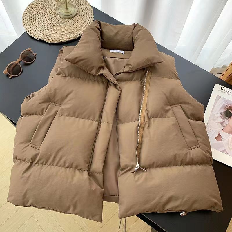Ladies quilted vests with high collar and practical side pockets Lune London