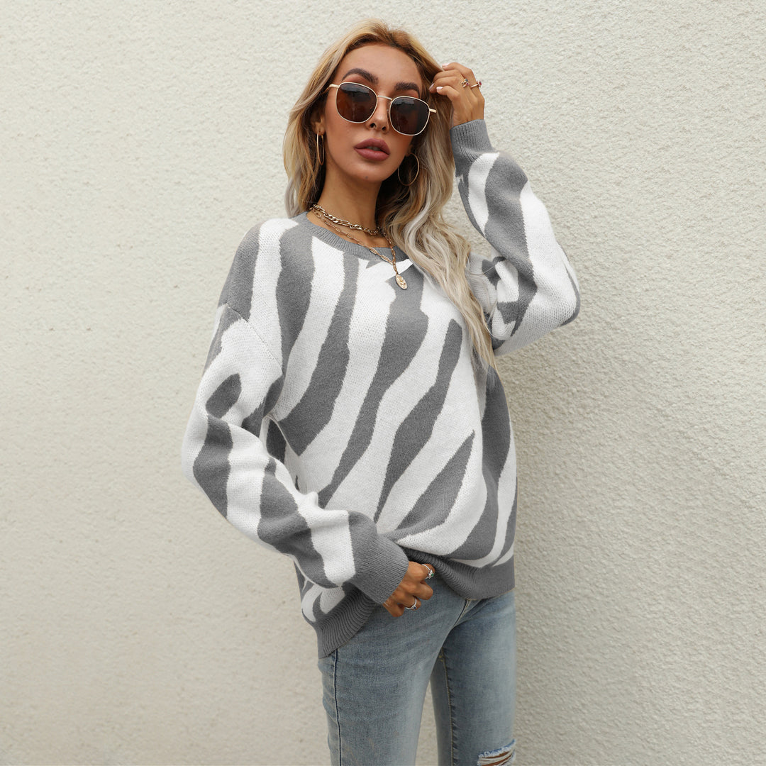 Pull tricoté élégant pour femmes avec un motif animal frappant et une coupe innovante Chic & Stil