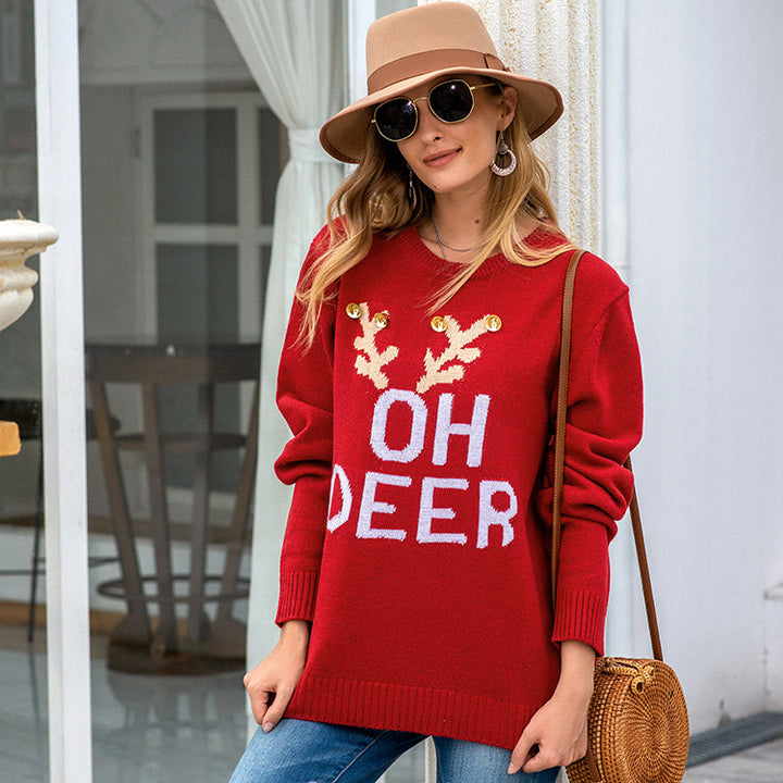 Knitted sweater for ladies with festive reindeer pattern and gold buttons Lune London