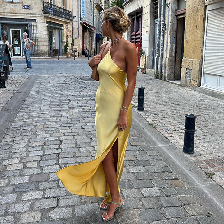 Maxi dress for ladies with asymmetric neckline and high slit Lune London