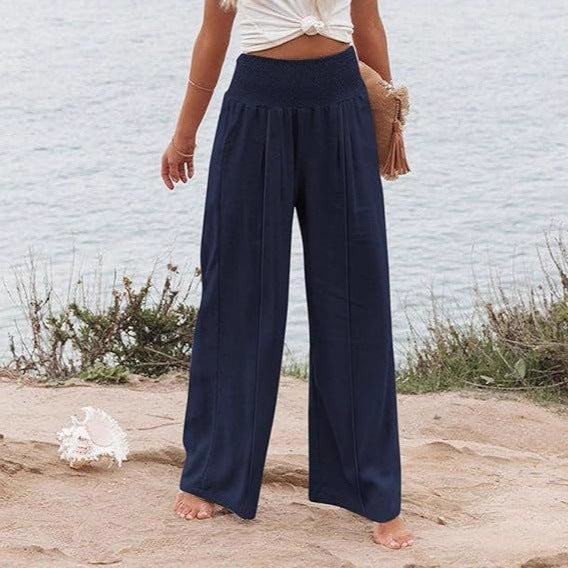Elegant and wide Palazzo trousers for women with high waist and draping Lune London