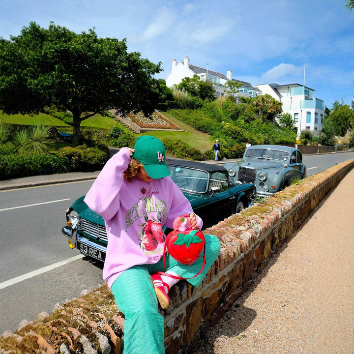 Trendy women's sweatshirt with a catchy strawberry design and a comfortable fit Lune London