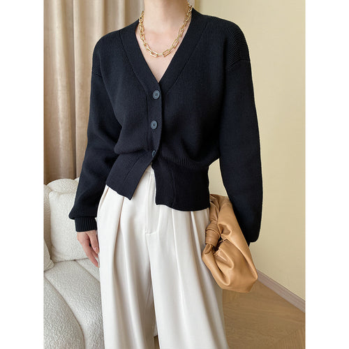 Ladies stylish cardigan with button details and elegant V-neck Chic & Stil