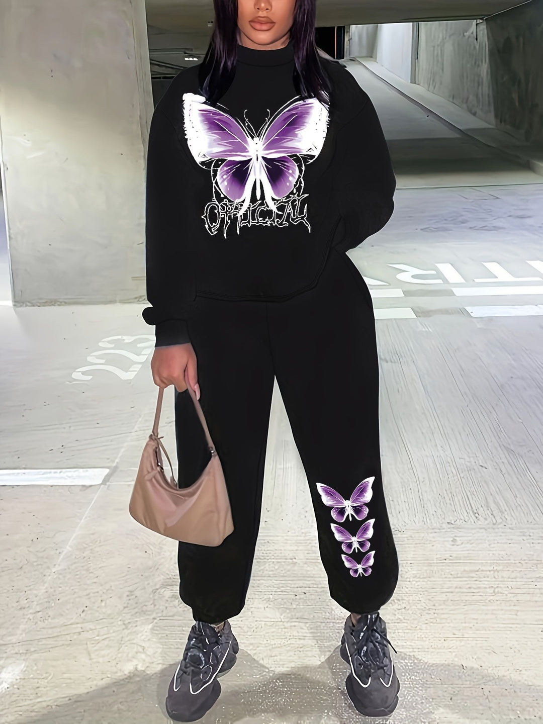 Women's sweatshirt and jogger pants set with a creative butterfly design Lune London