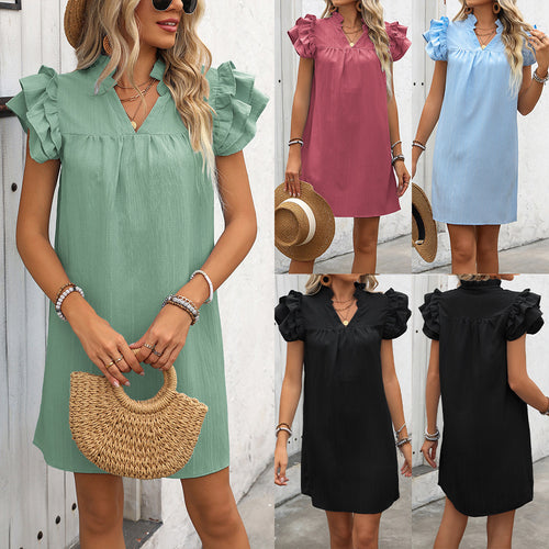 Elegant short-sleeve dress for ladies with ruffle details and V-neck Lune London