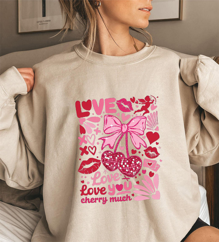 Sweat-shirt pour femmes avec des manches volumineuses et un motif cerise ludique Chic & Stil
