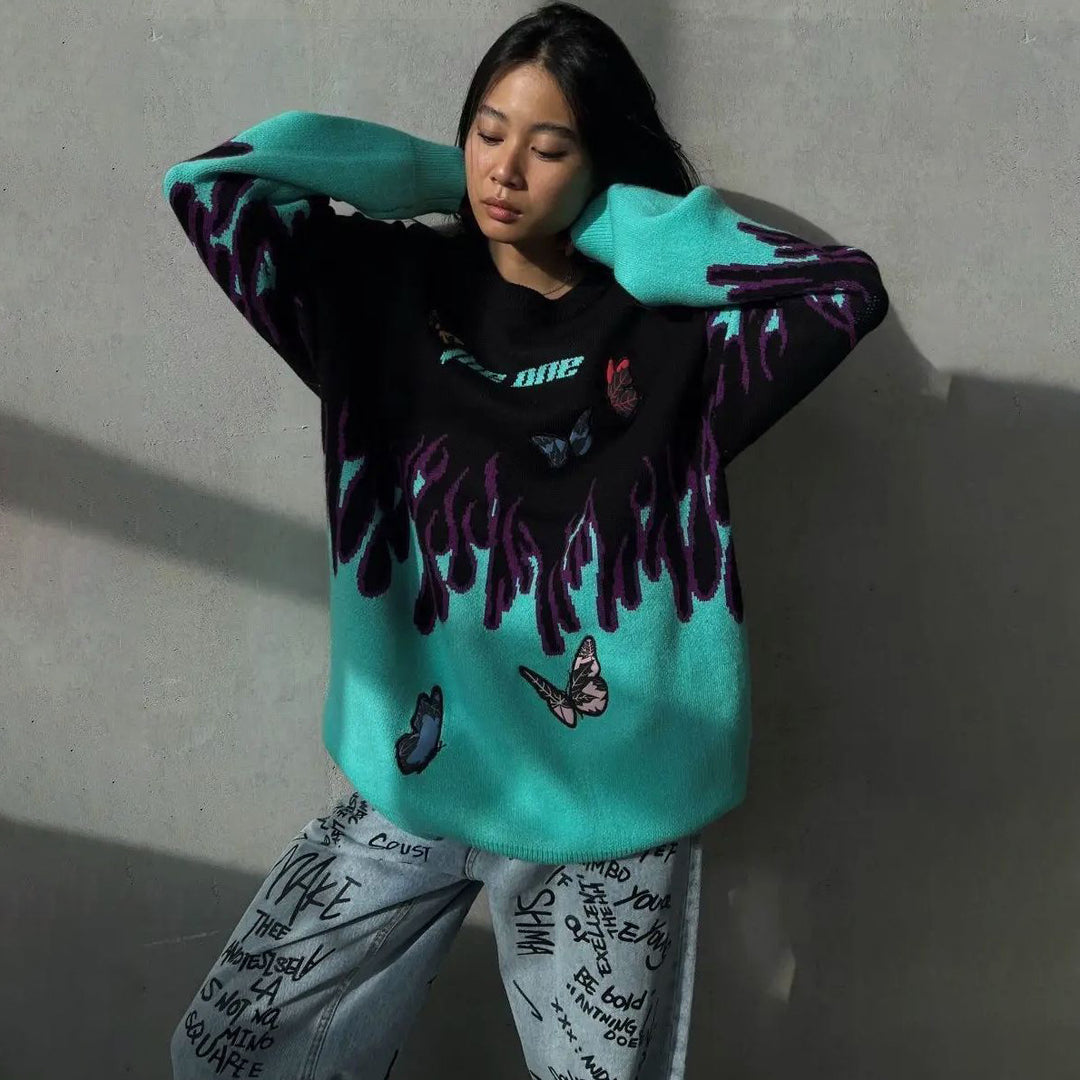 Chunky knit sweater for women with a unique design of flames and butterflies Lune London