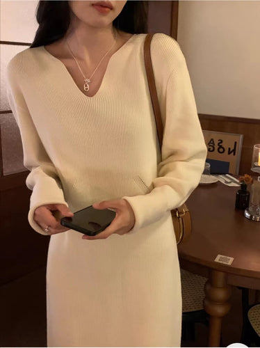 Knit dress for women with deep V-neck and specially designed structure Lune London