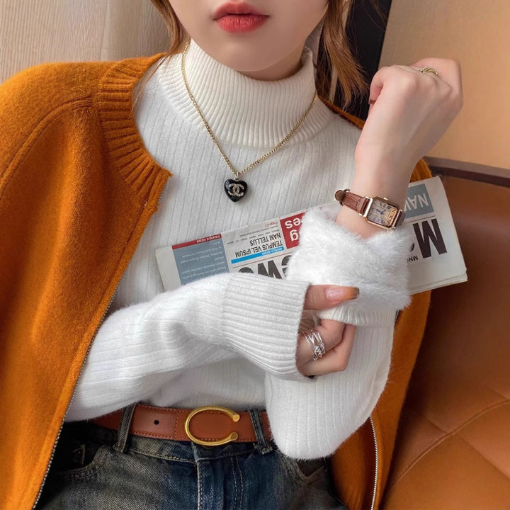 Pull femme avec col roulé et ourlet moelleux luxueux Chic & Stil