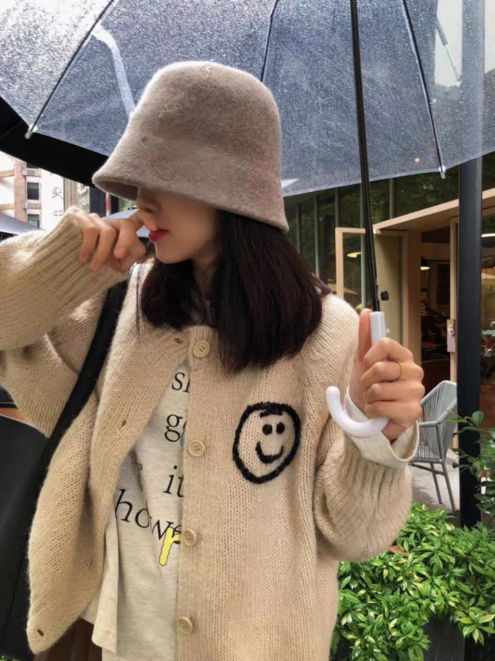 Women's cardigan and comfortable knit with playful Smiley pattern Lune London