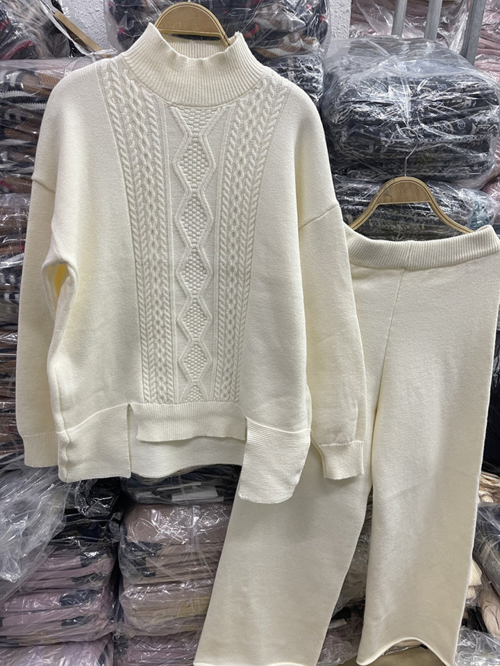 Elegant women's knit set with high collar and colorful pattern Lune London