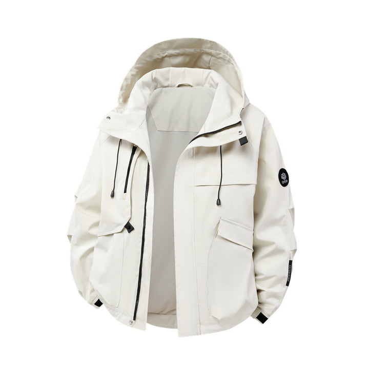 Technical outdoor jacket for men in waterproof material with numerous zippered pockets Lune London
