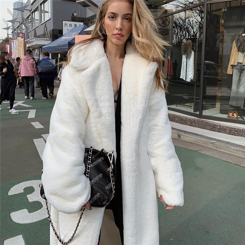 Oversized faux fur coat for women with hood and textured design Lune London
