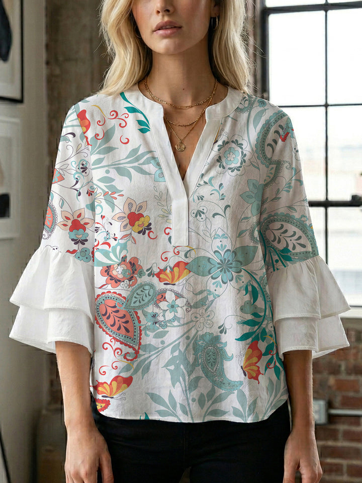 Ladies elegant top with voluminous ruffle hems and floral design Lune London