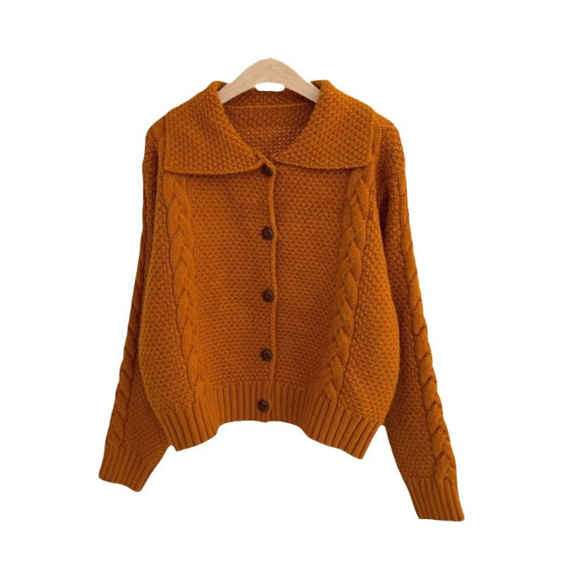 Women thick knit cardigan with contrasting buttons and a textured design Lune London