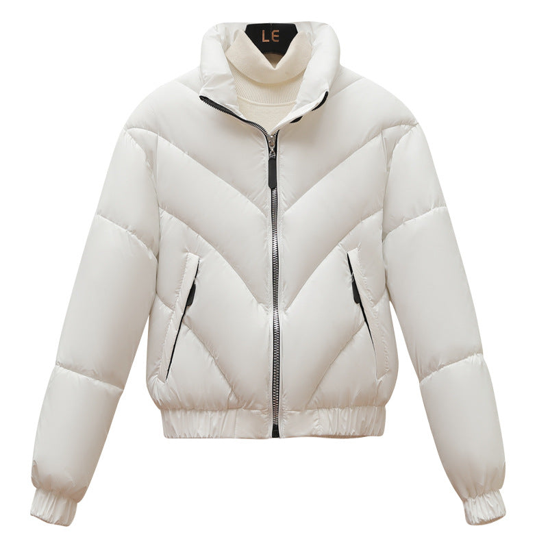 Trendy and comfortable women's puffer jacket with high collar and practical piped pockets Lune London