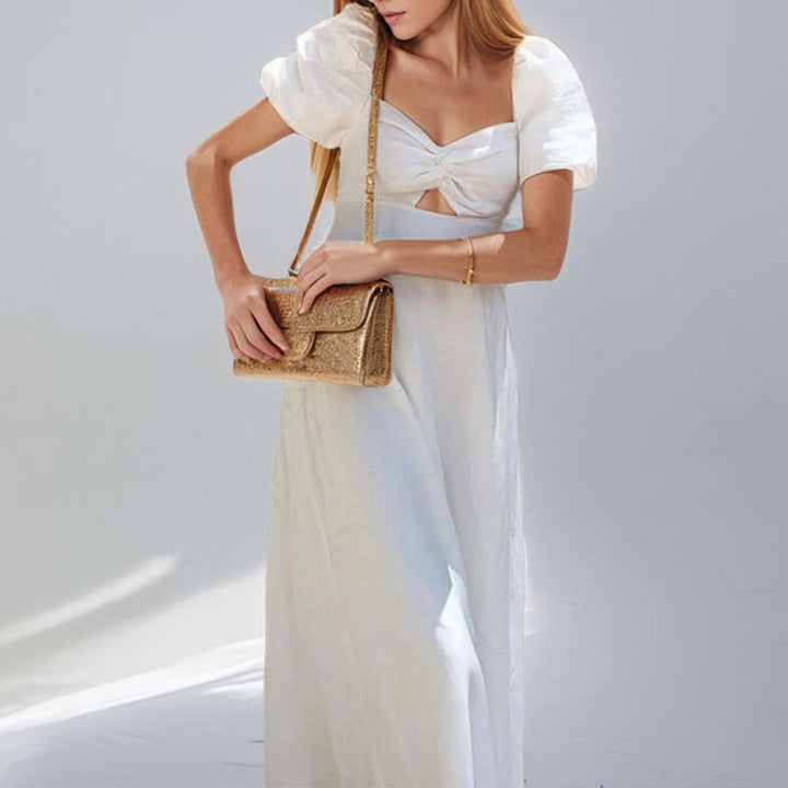 Robe maxi pour femmes avec un design clé sophistiqué et des manches puff volumineuses Chic & Stil