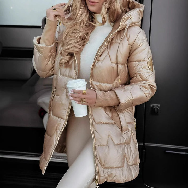 Ladies long quilted jacket with hood and practical pockets Lune London
