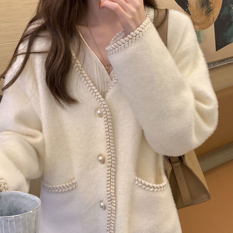 Ladies elegant cardigan with decorative pearl accents Lune London