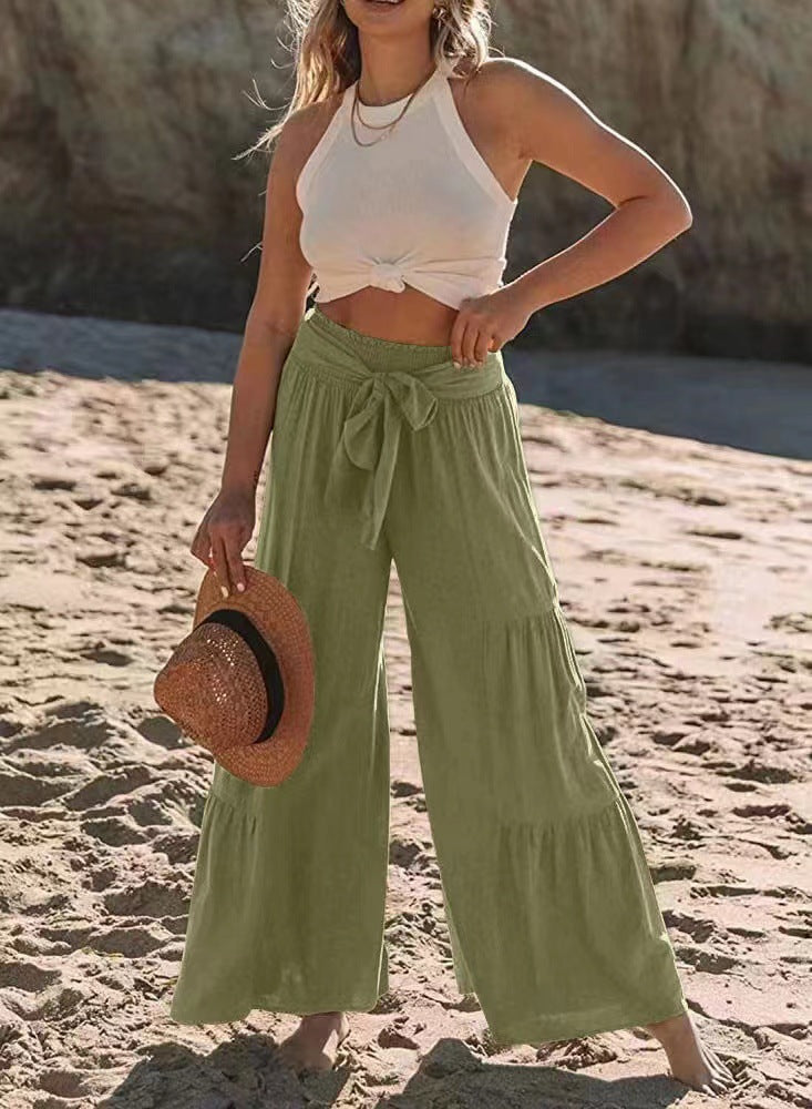 Airy palazzo pants for women with elastic waistband and practical tied belt Lune London