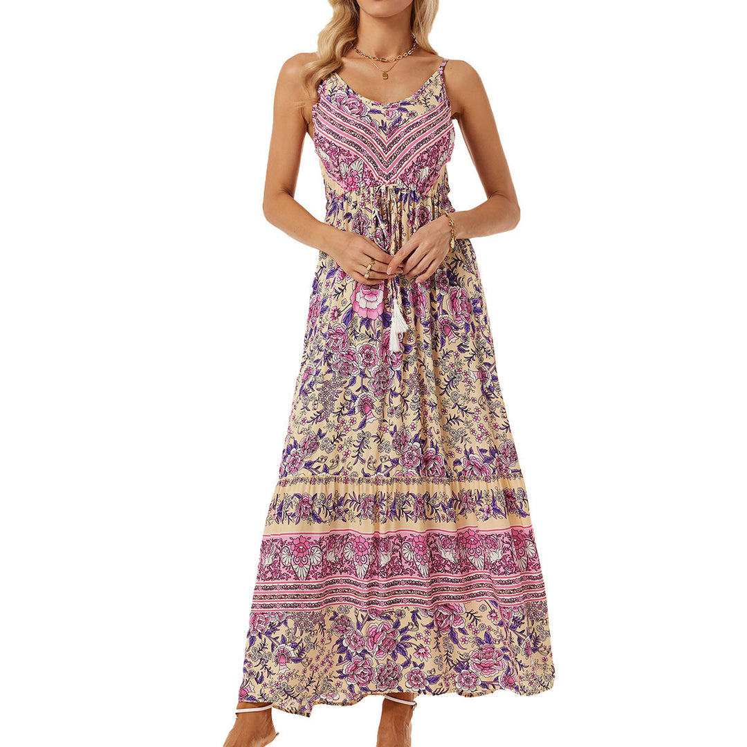 Airy maxi dress for women with a playful floral design and a drawstring at the waist Lune London