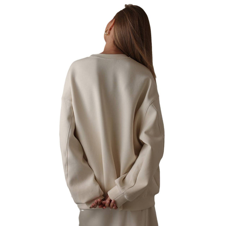 Women's sweatshirt with floral appliqués and a chic casual cut
