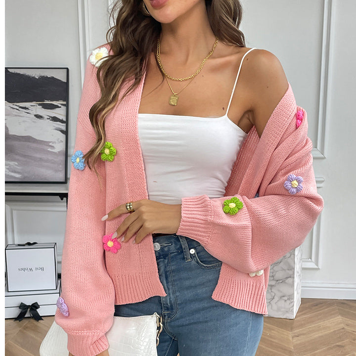 Ladies casual knitted cardigan with colorful flower appliqués Lune London