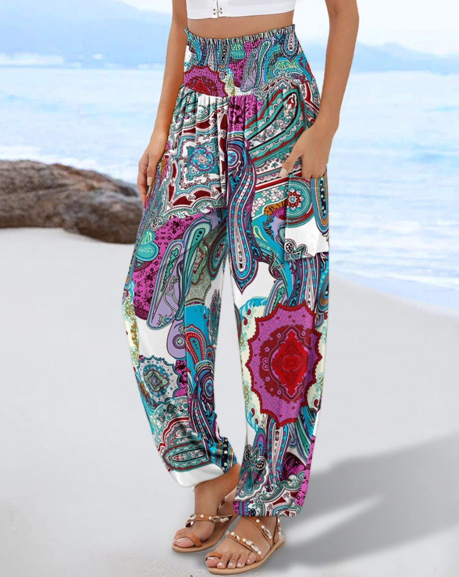 Wide Palazzo pants for women with colorful Paisley pattern and elastic waistband Lune London