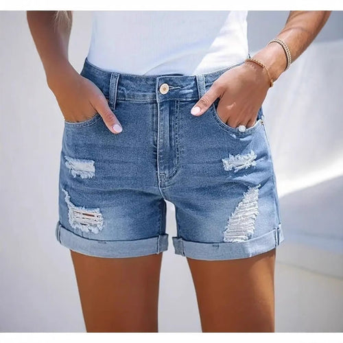 Women's short destroyed denim shorts in a casual look with rolled hems and stylish ripped details Lune London