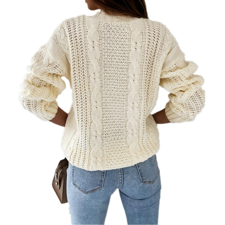 Women's knitted jacket with decorative cable design and unique button details Lune London