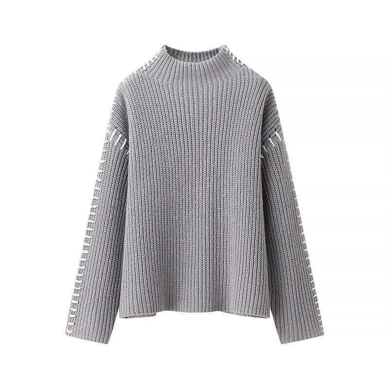 Women’s knitted sweater with high neck and elegant side details Lune London