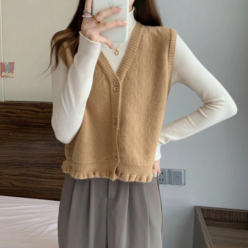 Gilet en tricot pour femme avec ourlet à volants ludiques Chic & Stil