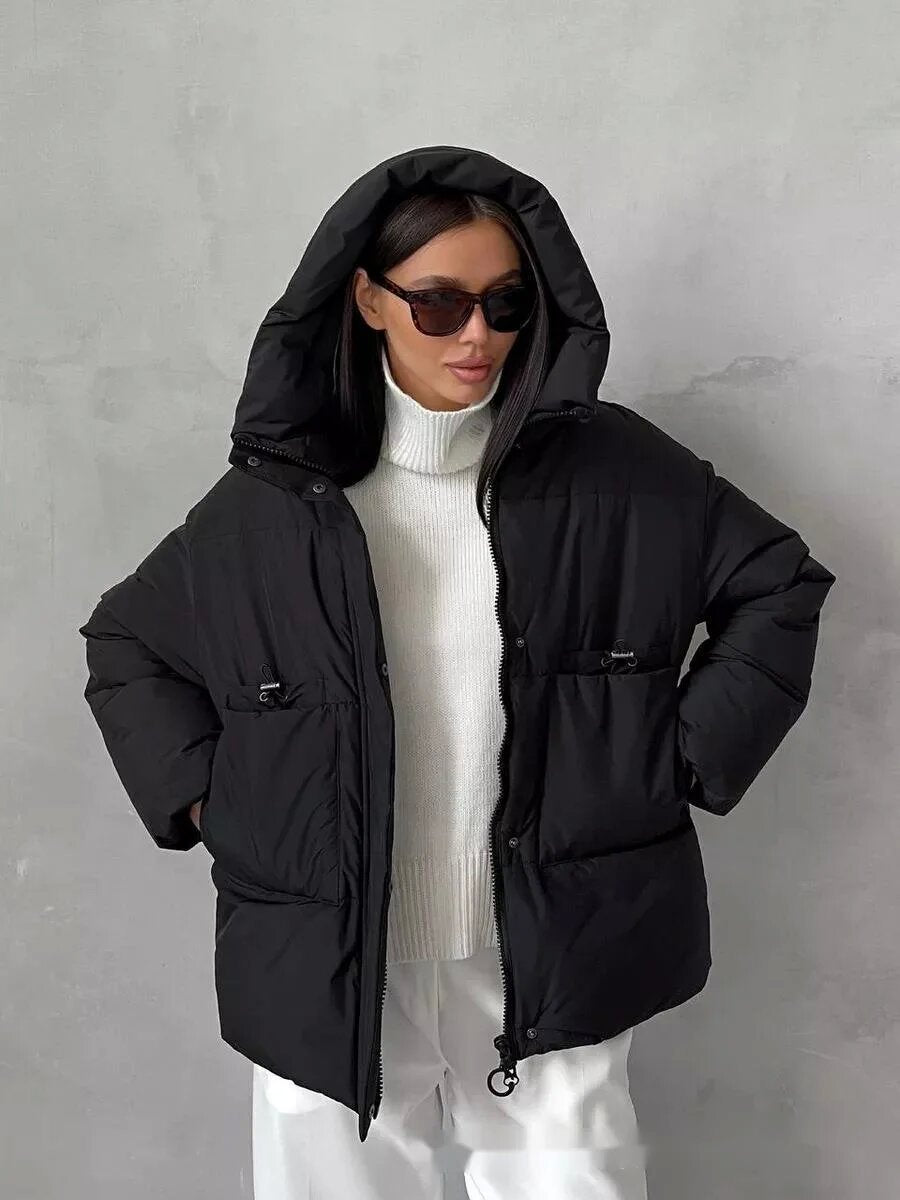 Sporty winter jacket for women with high collar and practical pockets Lune London