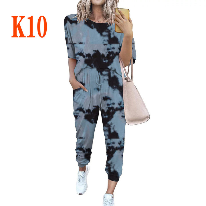 Ladies lightweight casual jumpsuit with a striking tie-dye pattern and practical pockets Lune London