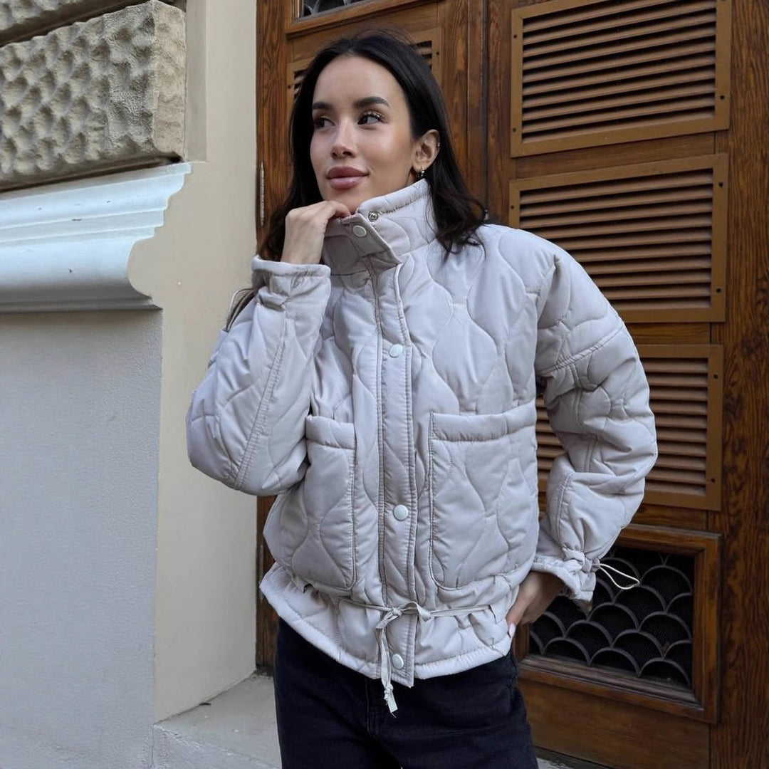 Quilted transitional jacket for women with high collar and drawstring Lune London