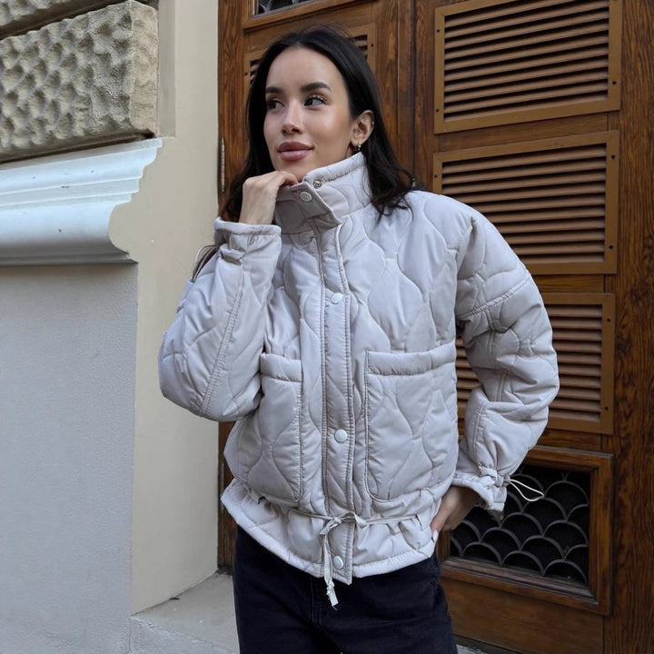Quilted transitional jacket for women with high collar and drawstring Lune London