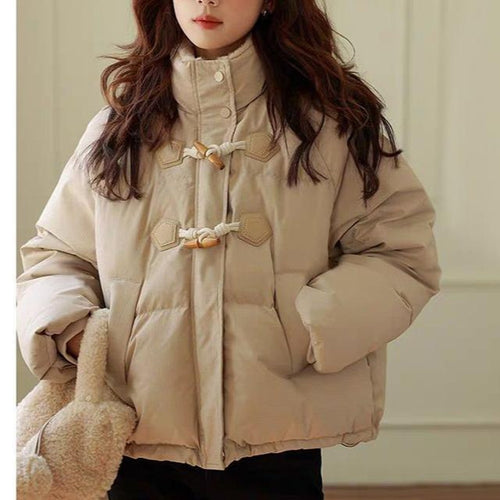 Veste matelassée oversize pour femme avec col haut et détails de bouton Chic & Stil