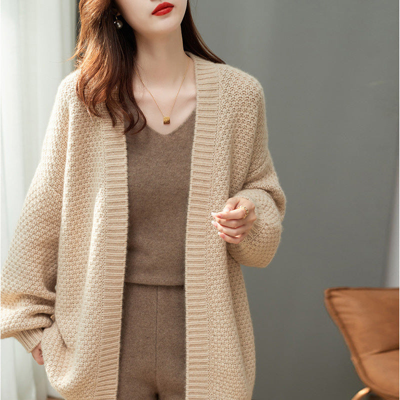 Ladies chunky knit cardigan with a loose fit and long sleeves Lune London