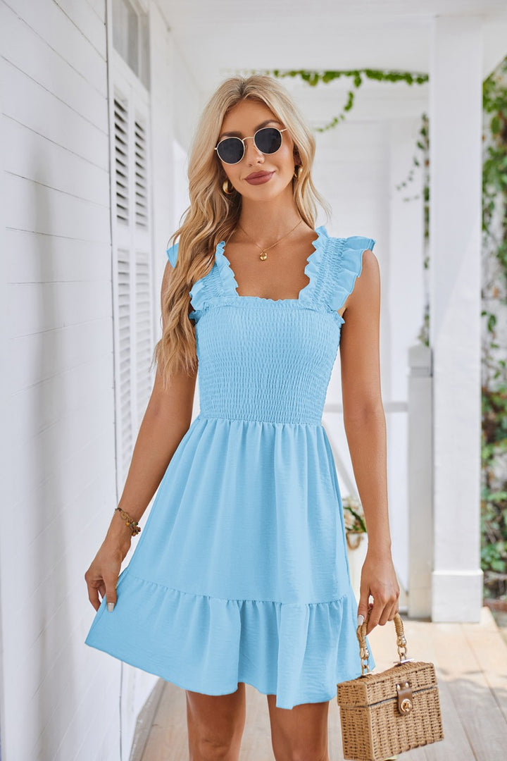 Summer mini dress for women with ruffle details and a fitted cut Lune London