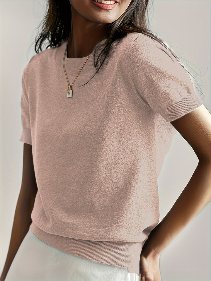 Fine knit sweater for women with a short sleeve silhouette and a soft fluid material Elegance and style