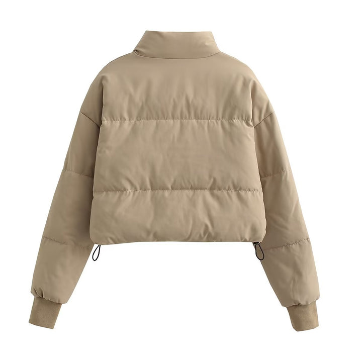 Ladies cropped quilted jacket with high collar and practical zip pockets Lune London