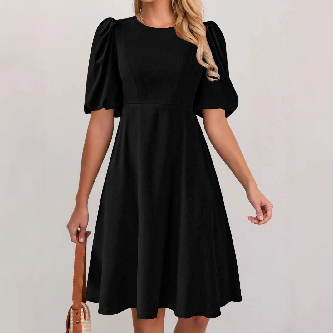 Puff sleeve dress for women with a flowing cut and waist accentuation Lune London