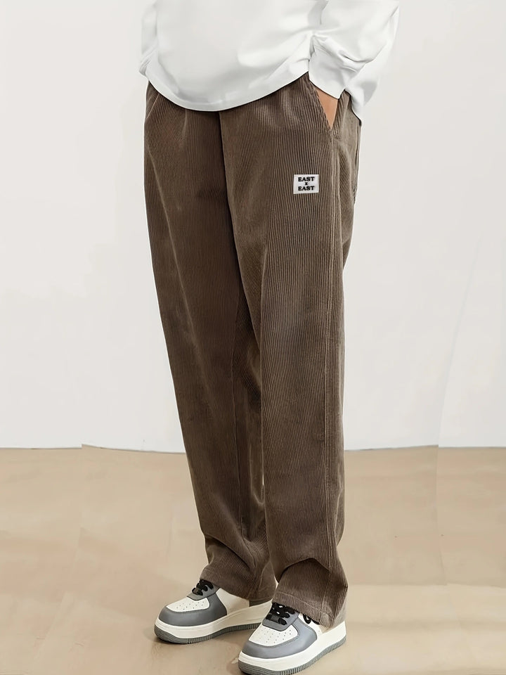 Women's wide corduroy trousers with elastic waistband and side pockets Chic & Stil