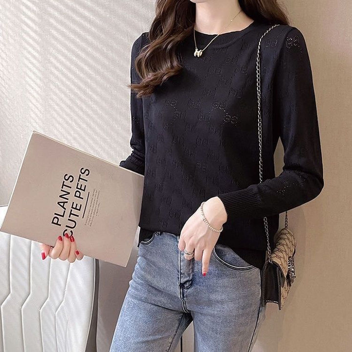 Pull en maille pour femmes avec une texture élégante en motif œillet Chic & Stil
